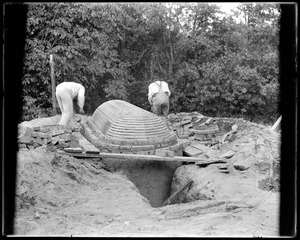 Sewer construction, showing center for flushing manhole