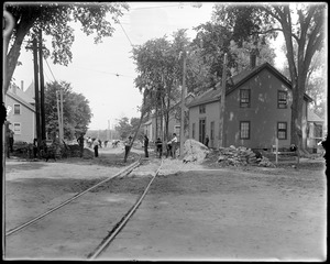 Lowell Street looking west from Elm Street during construction of street railroad