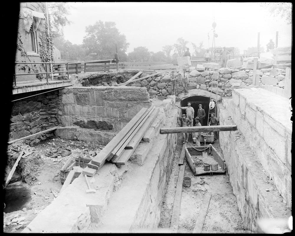 Head gate construction, showing office foundation and arches looking from the mill