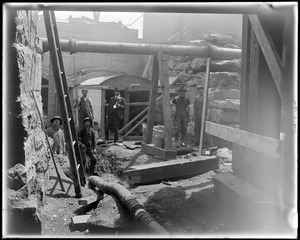 Head gate construction, showing form for arches (down in the hole)