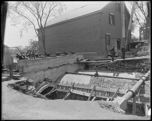 Head gate construction, showing head work and arches covered with concrete and partly smoothed