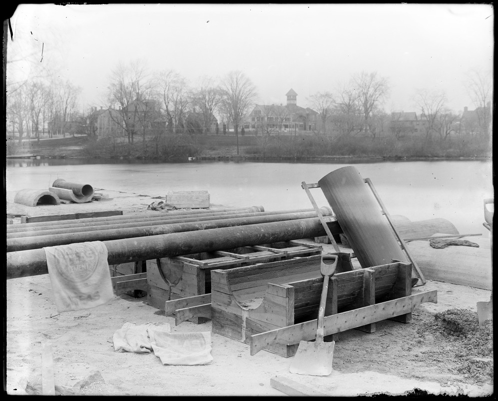 Cement covering for town water pipe over arches (making)