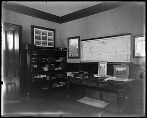 Mr. Clark's office showing table and bookcase