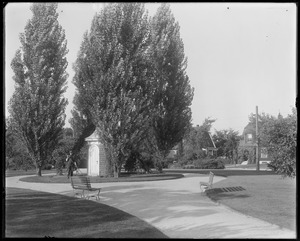 Talbot oval sowing center and tool house, Norris Millbury with rake