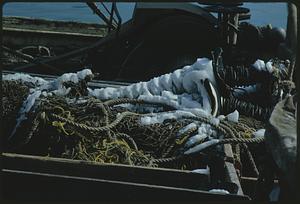 Snow on part of boat rigging