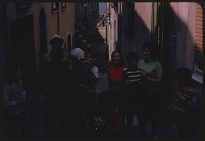 Group posing in street, Roccasicura, Italy