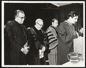 Inauguration of Bentley College’s fourth president, Dr. Gregory H. Adamian, second from right, was followed with prayers by Rt. Rev. Vatche Hovsepian, far right. Most Rev. Humberto Medeiros, left, and Henry E. Rauch, chairman of the college’s board of trustees, bow their heads.