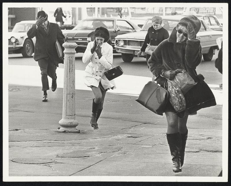 March-Like Winds came early to Boston yesterday. Cold, biting gusts up to 56 miles per hour kept pedestrians bundled up and on the move.