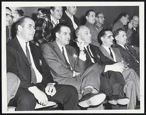 Getting Vote Result - While tabulators polled vote of workers at Lynn and Everett General Electric plants many waited to hear results. Among the interested group at the Lynn plant were, seated, from left: J. Leary of Belmont; G. Shea of Lynn; L.D. Smith Swampscott; A.E. Ringenwald of Saugus, and W.B. Pearson of Nahant. IUE was declared winner of the election.