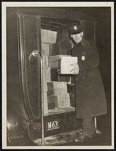 Patrolman Thom J. Lowndergan unloading