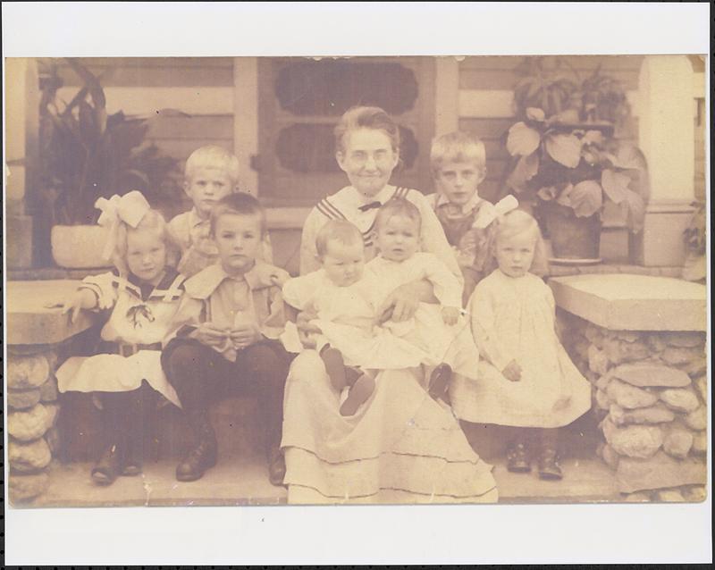 Augusta Allis with her grandchildren