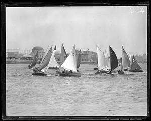 Frostbite yachts on the Charles River, Maclaurin Building's dome in background