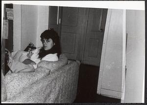Woman sitting on a couch