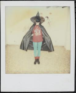 Young woman in witch costume