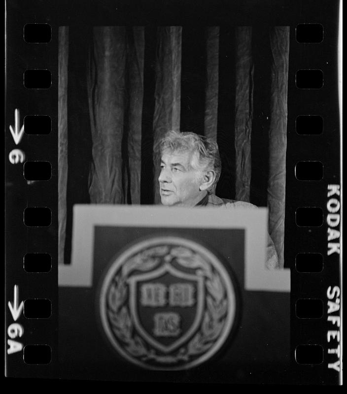 Leonard Bernstein rehearses a speech at Harvard's Sanders Theatre, Cambridge