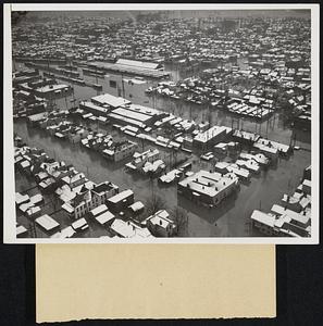 Portsmouth, Ohio, one of the hardest hit of the Ohio River Valley towns in the flood, viewed from the air. Sunday, January 24th. Practically the entire city is under water