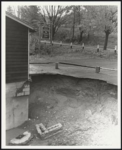 Erosion from storm at Pampered Poodle Shop on Rt. 114 Middleton.