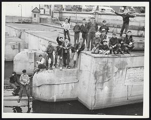 Fishing for Herring. Mystic River Locks at Medford