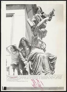 Vantage Point--Demonstrators gather on one of statues on Boston Common Wednesday to participate in springtime antiwar protests. A crowd from 25,000 to 60,000 is expected by sponsors of the 7 1/2 hour demonstration.