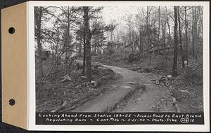 Contract No. 106, Improvement of Access Roads, Middle and East Branch Regulating Dams, and Quabbin Reservoir Area, Hardwick, Petersham, New Salem, Belchertown, looking ahead from Sta. 199+25, access road to East Branch Regulating Dam, Belchertown, Mass., May 21, 1940