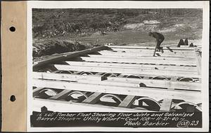 Contract No. 108, Utility Wharves, Quabbin Reservoir, Ware, 16 ft. by 40 ft. timber float showing floor joists and galvanized barrel straps, Ware, Mass., Nov. 21, 1940