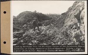 Contract No. 80, High Level Distribution Reservoir, Weston, looking northwest from the northwest corner of the gatehouse showing condition of clayey material at site of reservoir intake, high level distribution reservoir, Weston, Mass., Apr. 2, 1940