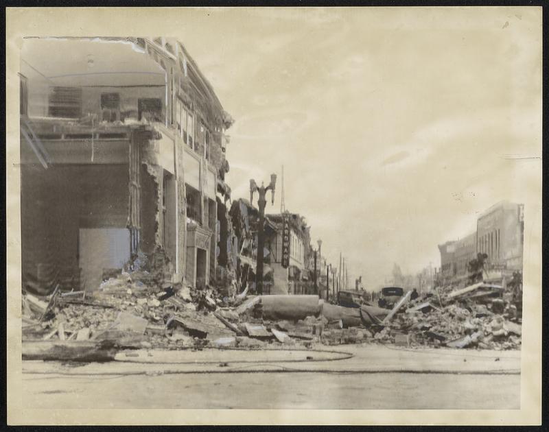 Quake Wrecks Compton's Main Street. Telephoto from Los Angeles to New York showing wreckage in the Main Street of Compton, Calif., where 13 died in the earthquake of March 10.