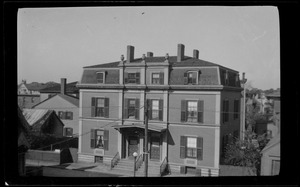 Large two-family house with mansard roof, likely Providence, Rhode Island