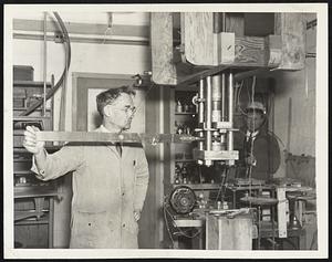 Pressures While You Wait Announcement of new apparatus which imposes pressures of 1,000,000 pounds a square inch, makes ice hotter than boiling water, and graphite scratch steel was made today at Harvard University. The pressure chamber shown above, made of steel, cone-shaped, and backed by a form-fitting steel block, makes possible pressures nearly twice the limit that formerly made steel bulge like lead.