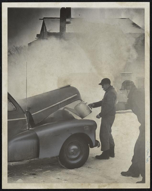 Unhappy Motorists in many parts of sub-zero Greater Boston went through this de-icing procedure to get their cars started this morning. Big question for many: is the block cracked?