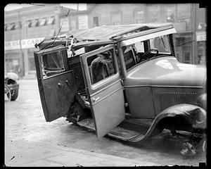 Bandits car wrecked at Grove Hall, Dorchester