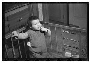 Toddler in crib