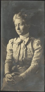 Harriet Armington Brown Day seated with hands folded