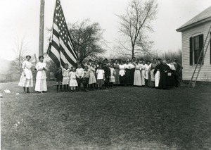 Raising the flag at the Glendale School on Arbor Day