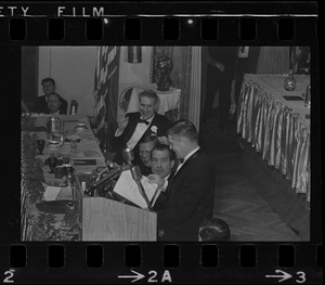 Gov. John A. Volpe and presidential candidate Richard Nixon watch unidentified speaker at the Middlesex Club Lincoln Day Dinner