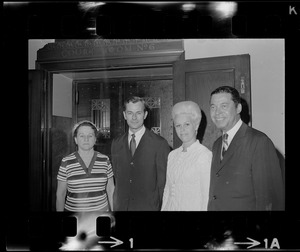 Unidentified woman, John A. Birknes, Mrs. John A. Birknes, and Sen. Edward Brooke after Birknes was sworn in as U. S. Marshal for Massachusetts