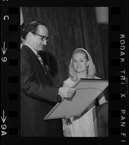 Dr. Tom Frei, president of American Association for Cancer Research, accepts from Patricia Nixon Cox framed reproduction of the National Cancer Act of 1971 during ceremonies at the Sheraton Plaza
