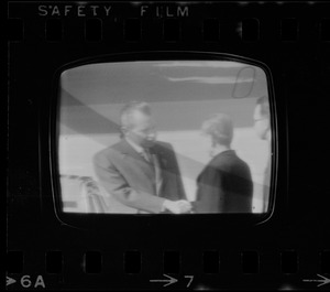 Television showing President Richard Nixon and Pat Nixon arriving in Beijing