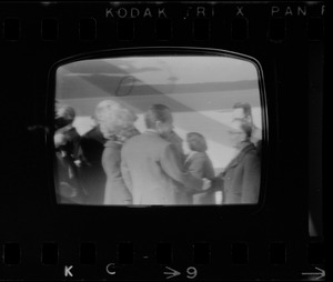 Television showing President Richard Nixon and Pat Nixon arriving in Beijing