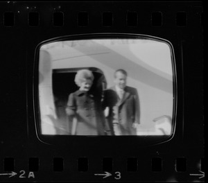 Television showing President Richard Nixon and Pat Nixon arriving in Beijing