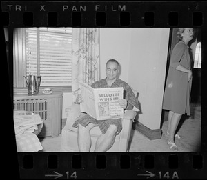Francis X. Bellotti reading the newspaper the morning after defeating Endicott Peabody in the Democratic primary race for Governor
