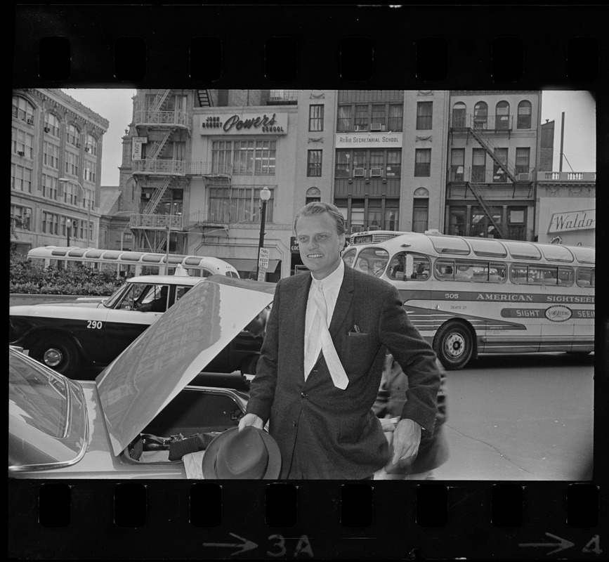 Billy Graham outside of Hotel Statler Hilton in Boston