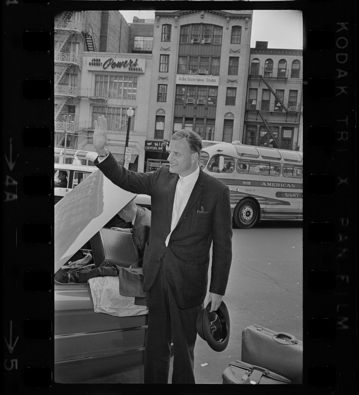 Billy Graham outside of Hotel Statler Hilton in Boston