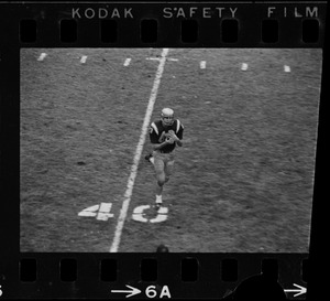 Football player running with ball