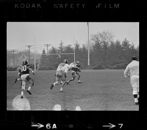 Football player getting tackled during game