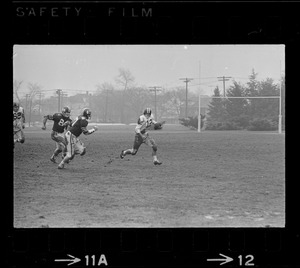 Football player running with the ball