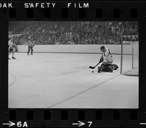 Boston Bruins goalie, Bernie Parent (no. 30), making a save in game against the Toronto Maple Leafs