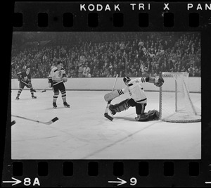 Boston Bruins goalie, Bernie Parent (no.30), making a save in game against Toronto Maple Leafs