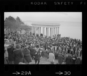 Billy Graham speaking in front of crowd by Plymouth Rock monument following the re-enactment of the landing of the Pilgrims