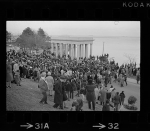 Billy Graham speaking in front of crowd by Plymouth Rock monument following the re-enactment of the landing of the Pilgrims